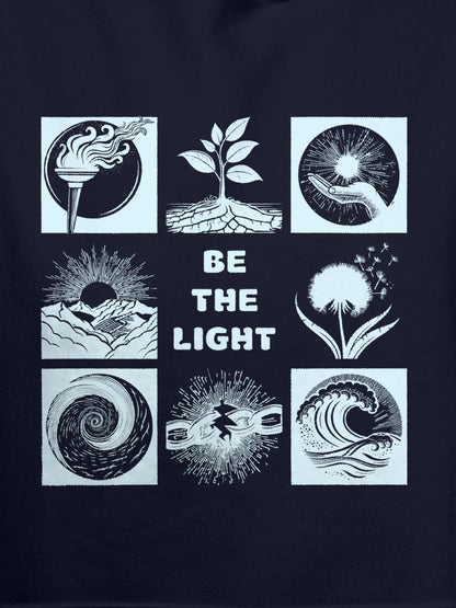 Close up of 'Be The Light' design on Women's Navy Blue Hoodie Sweatshirt, highlighting intricate details and vibrant print.