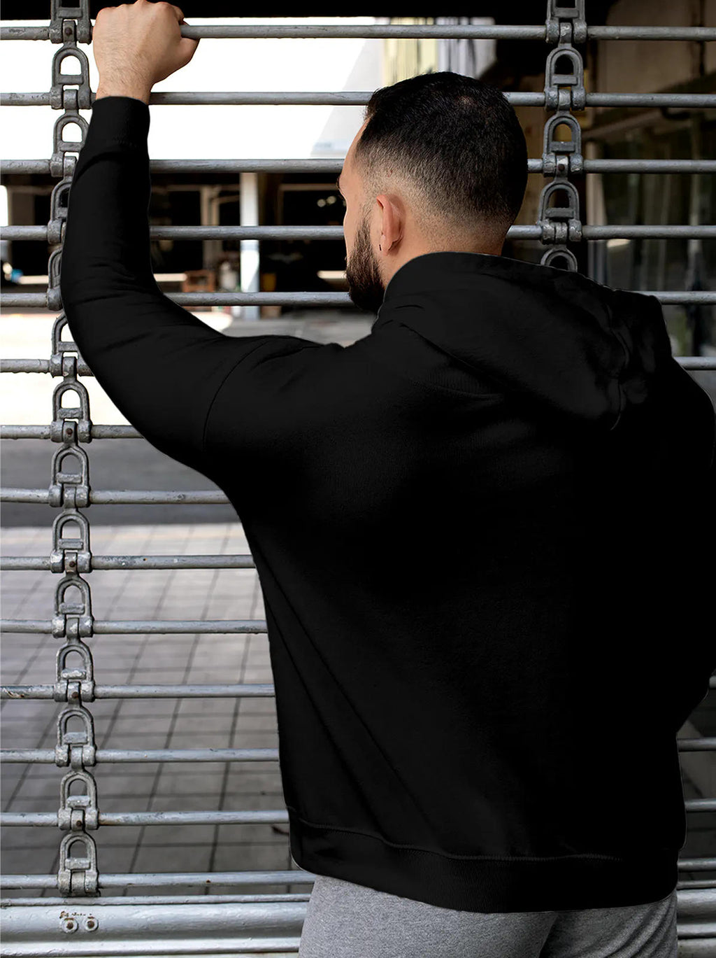 Back view of Fighterhero Men's Black Hoodie Sweatshirt, highlighting the modern look and clean finish