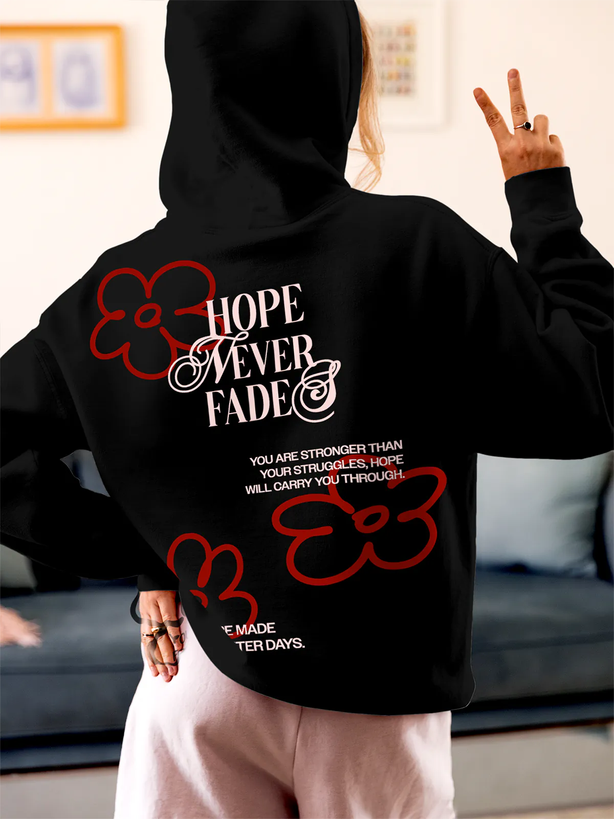 Fighterhero Hoodies: Model wearing Women's Black Hoodie Sweatshirt with 'Hope Never Fades' design