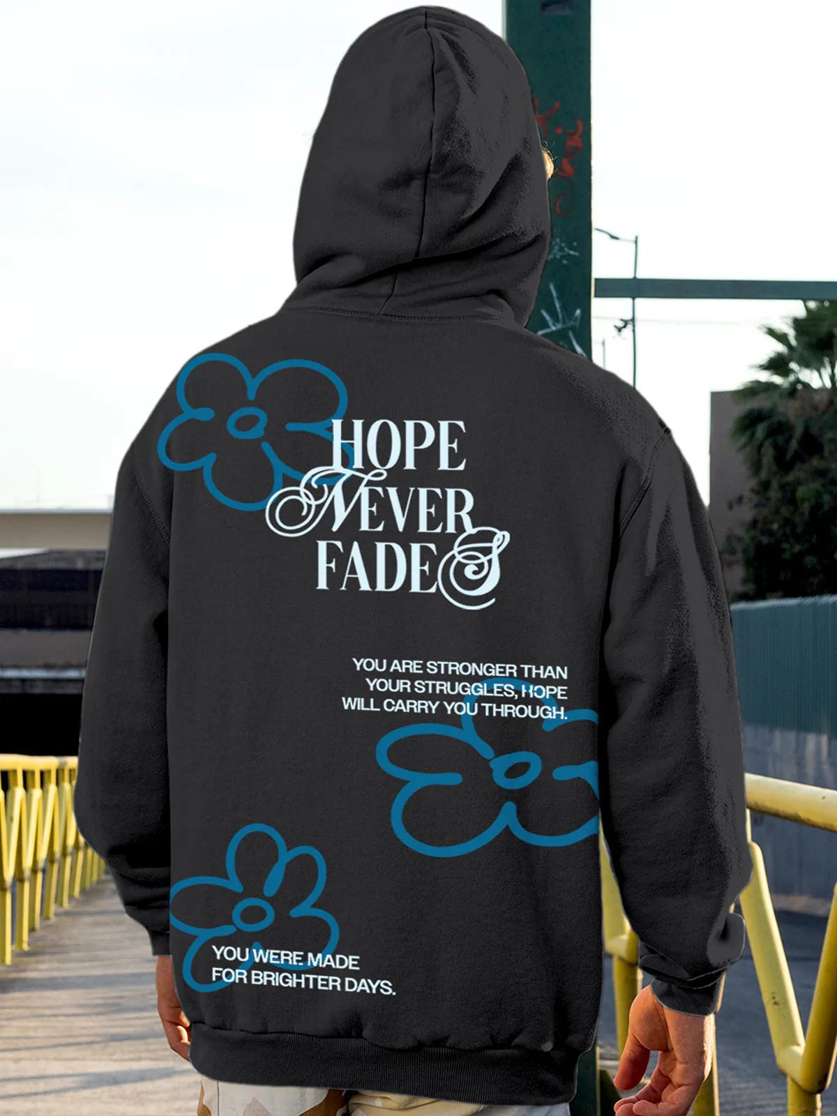 Model wearing Men's Dark Grey Hoodie Sweatshirt with 'Hope Never Fades' design, offering effortless style and premium comfort