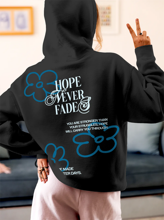 Fighterhero Hoodies: Model wearing Women's Dark Grey Hoodie Sweatshirt with 'Hope Never Fades' design