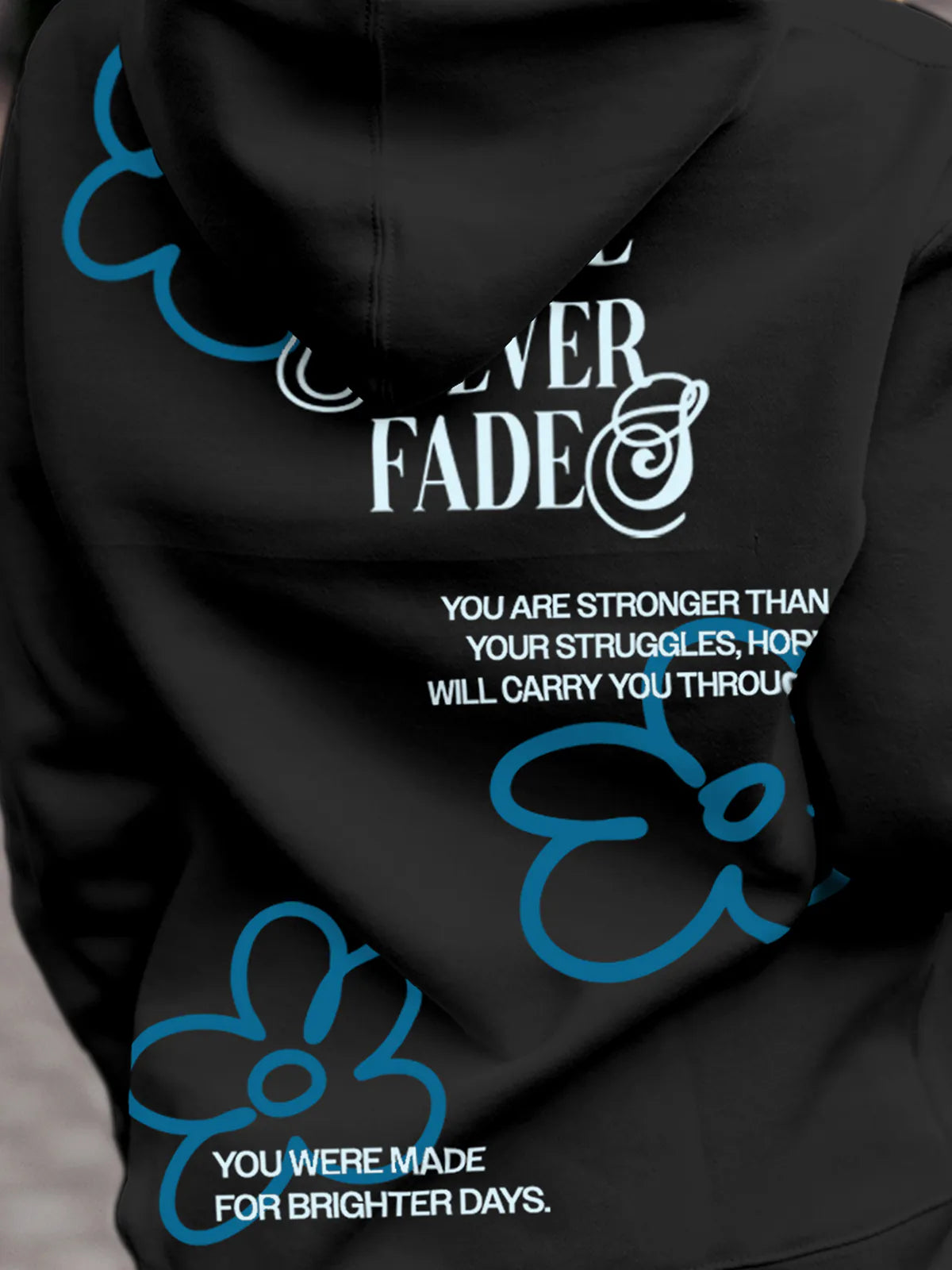 Close up of 'Hope Never Fades' design on Women's Dark Grey Hoodie Sweatshirt, highlighting intricate details and vibrant print.