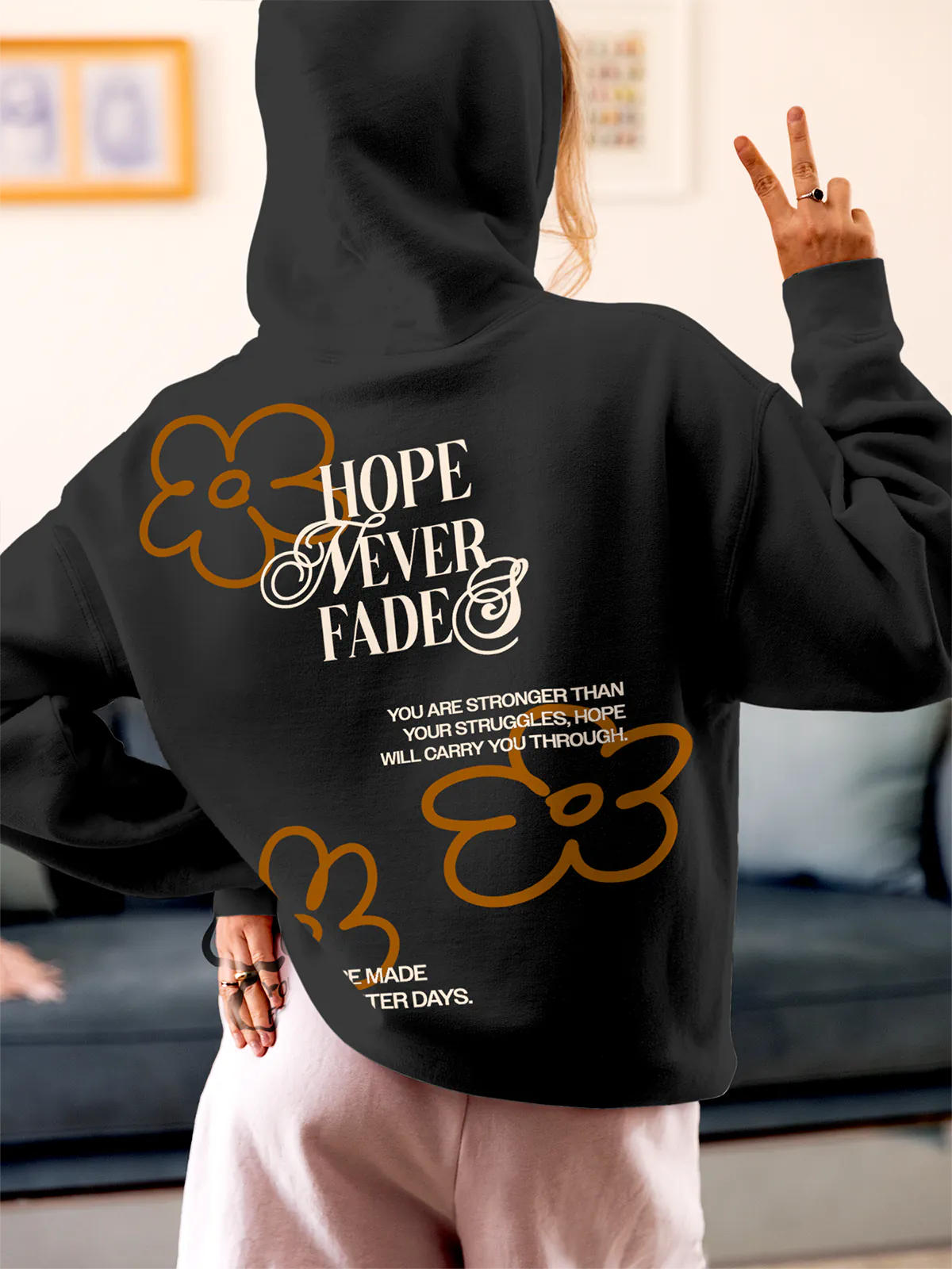 Model wearing Women's Dark Grey Hoodie Sweatshirt with 'Hope Never Fades' design, offering effortless style and premium comfort