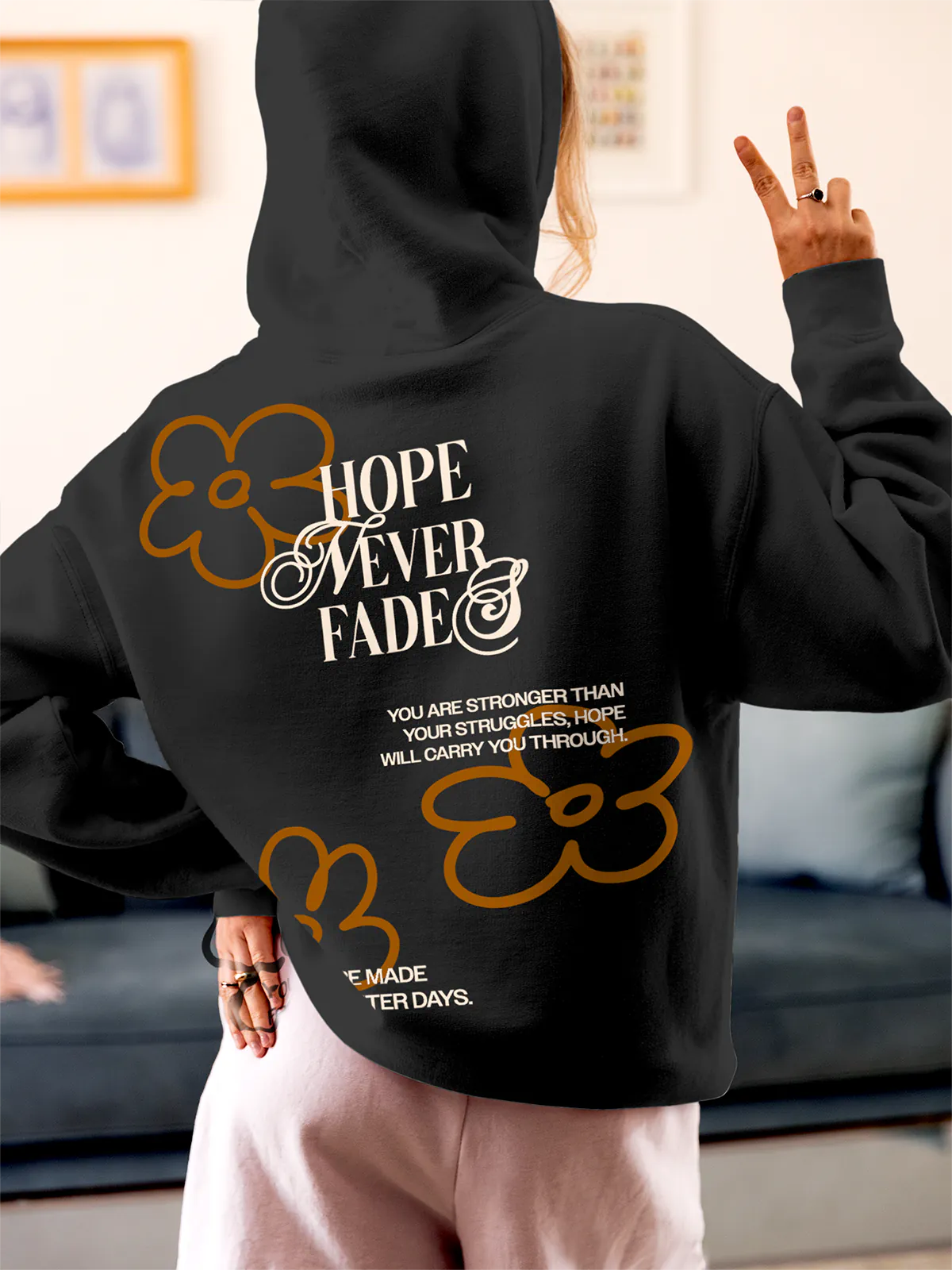Model wearing Women's Dark Grey Hoodie Sweatshirt with 'Hope Never Fades' design, offering effortless style and premium comfort