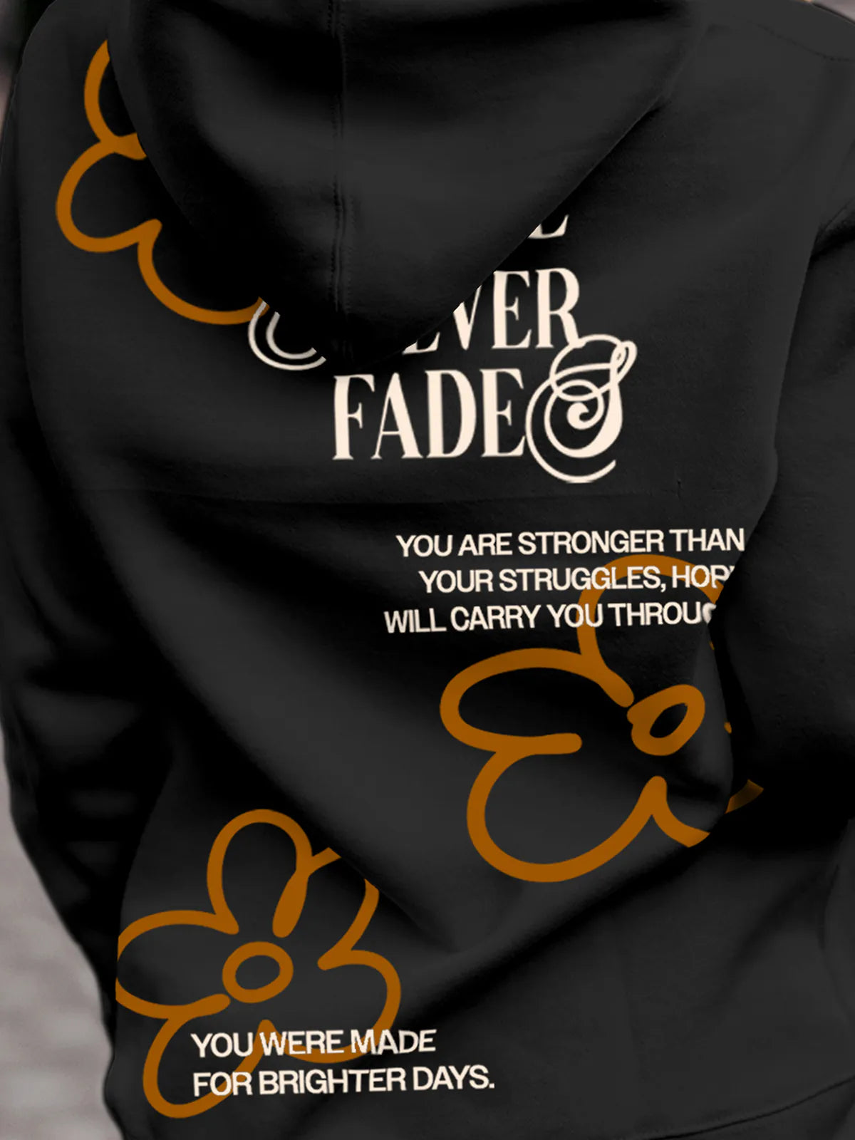 Close up of 'Hope Never Fades' design on Women's Dark Grey Hoodie Sweatshirt, highlighting intricate details and vibrant print.