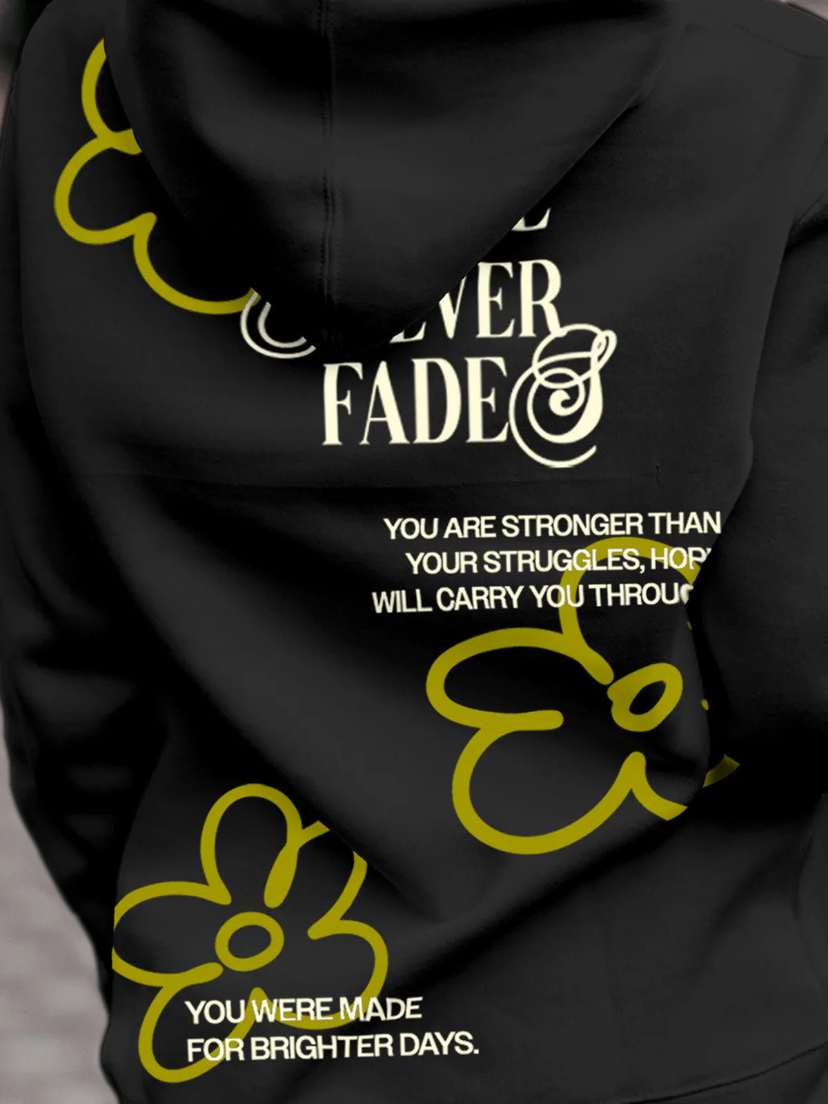 Close up of 'Hope Never Fades' design on Women's Dark Grey Hoodie Sweatshirt, highlighting intricate details and vibrant print.