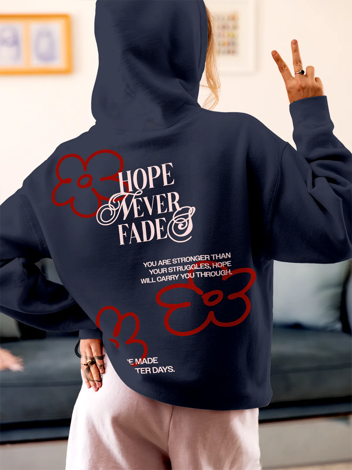 Model wearing Women's Navy Blue Hoodie Sweatshirt with 'Hope Never Fades' design, offering effortless style and premium comfort
