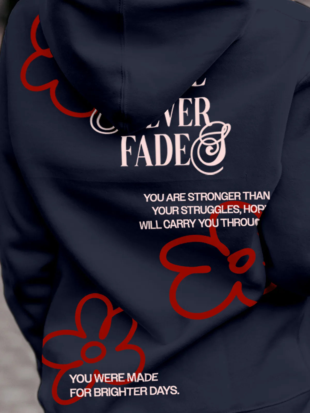 Close up of 'Hope Never Fades' design on Women's Navy Blue Hoodie Sweatshirt, highlighting intricate details and vibrant print.