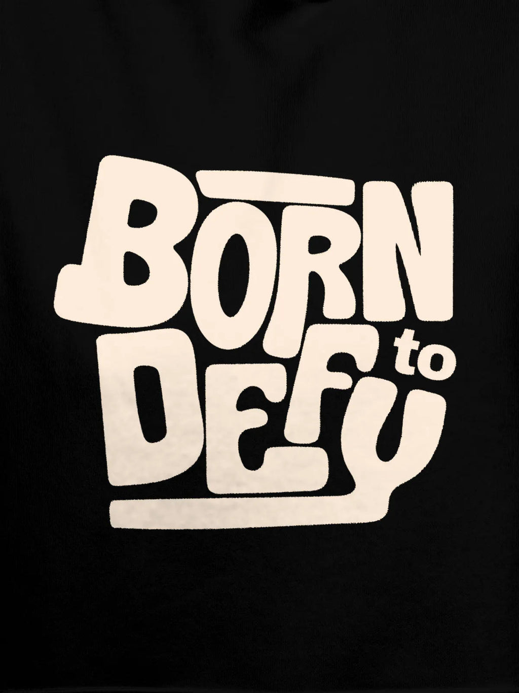 Close up of 'Born To Defy' design on Men's Black Hoodie Sweatshirt, highlighting intricate details and vibrant print.