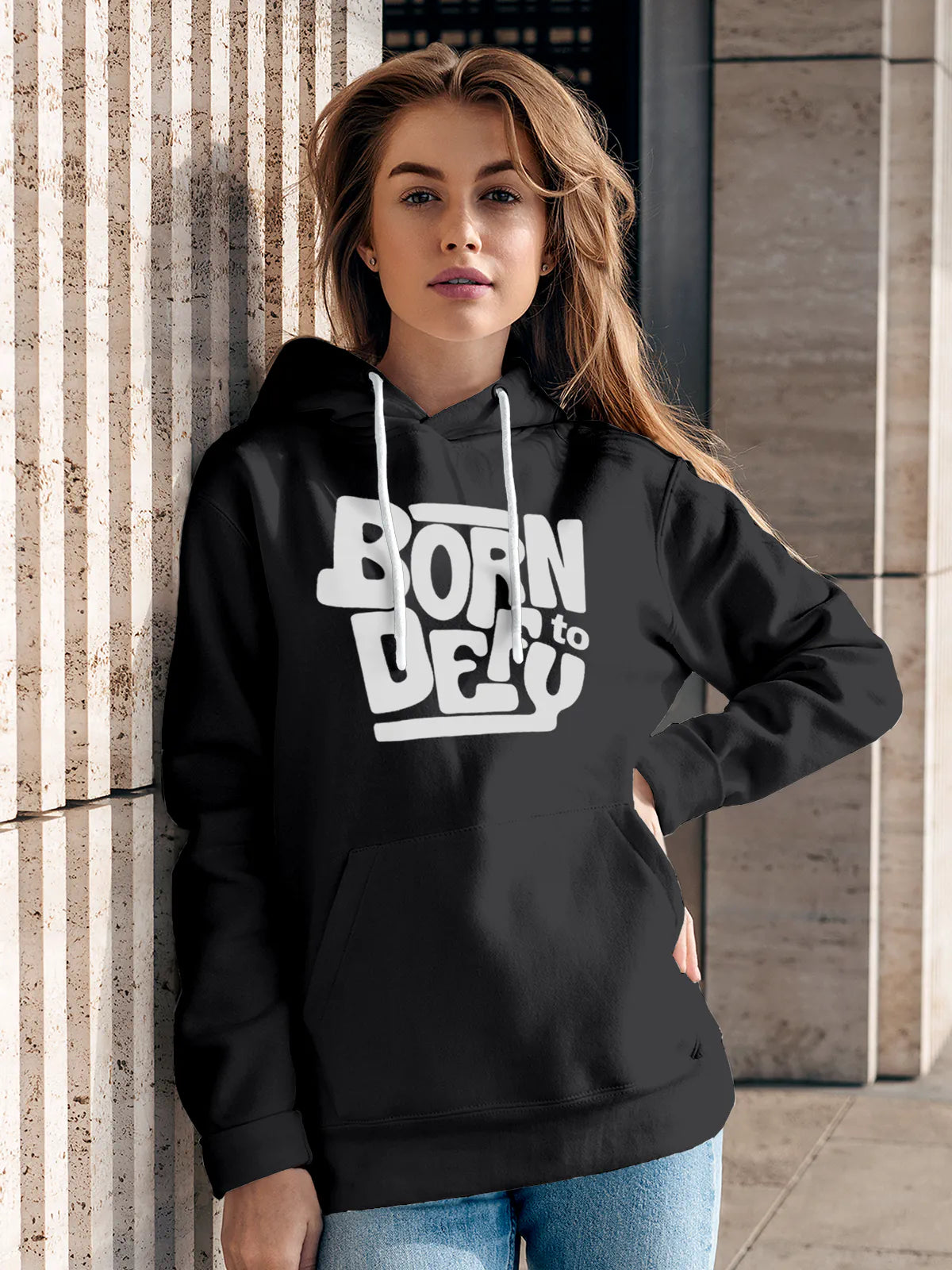 Model wearing Women's Dark Grey Hoodie Sweatshirt with 'Born To Defy' design, offering effortless style and premium comfort