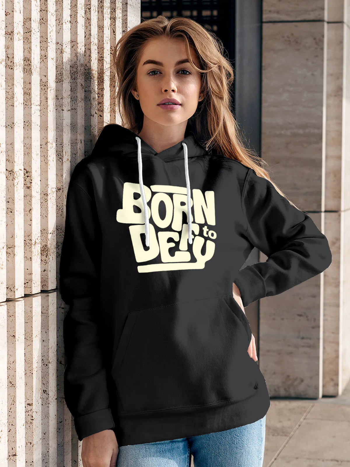 Model wearing Women's Dark Grey Hoodie Sweatshirt with 'Born To Defy' design, offering effortless style and premium comfort