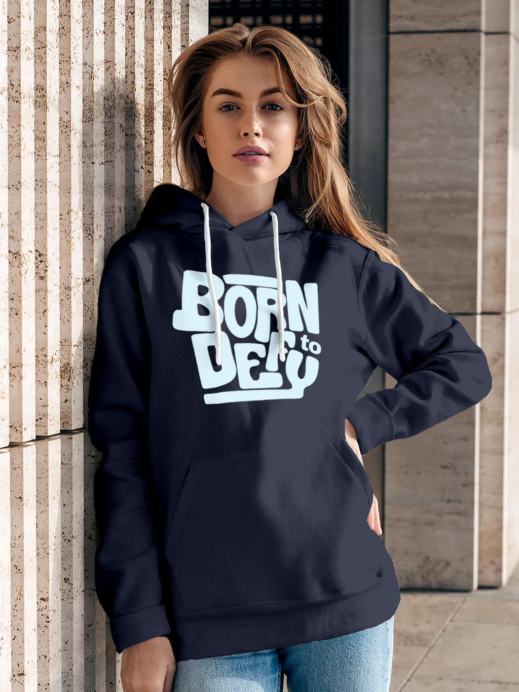 Model wearing Women's Navy Blue Hoodie Sweatshirt with 'Born To Defy' design, offering effortless style and premium comfort