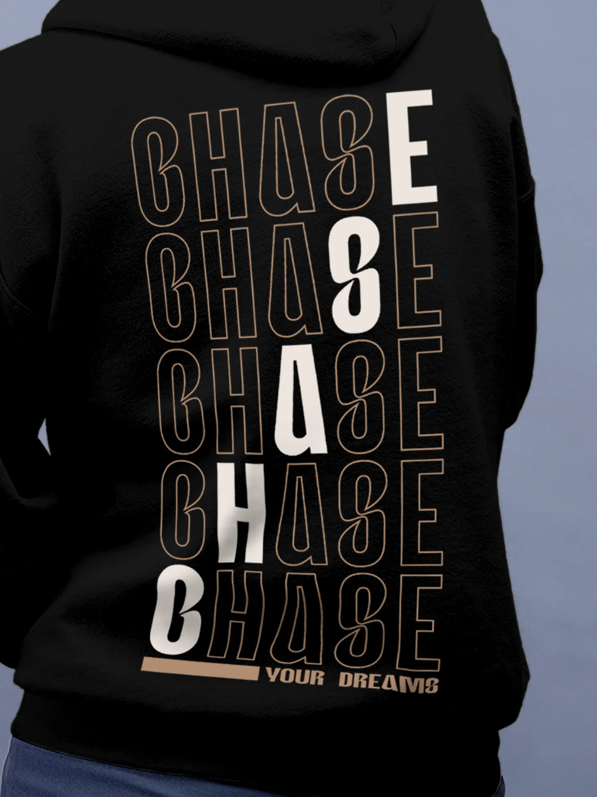 Close up of 'Chase Your Dreams' design on Women's Black Hoodie Sweatshirt, highlighting intricate details and vibrant print.