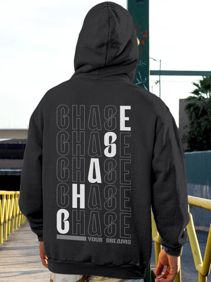 Model wearing Men's Dark Grey Hoodie Sweatshirt with 'Chase Your Dreams' design, offering effortless style and premium comfort