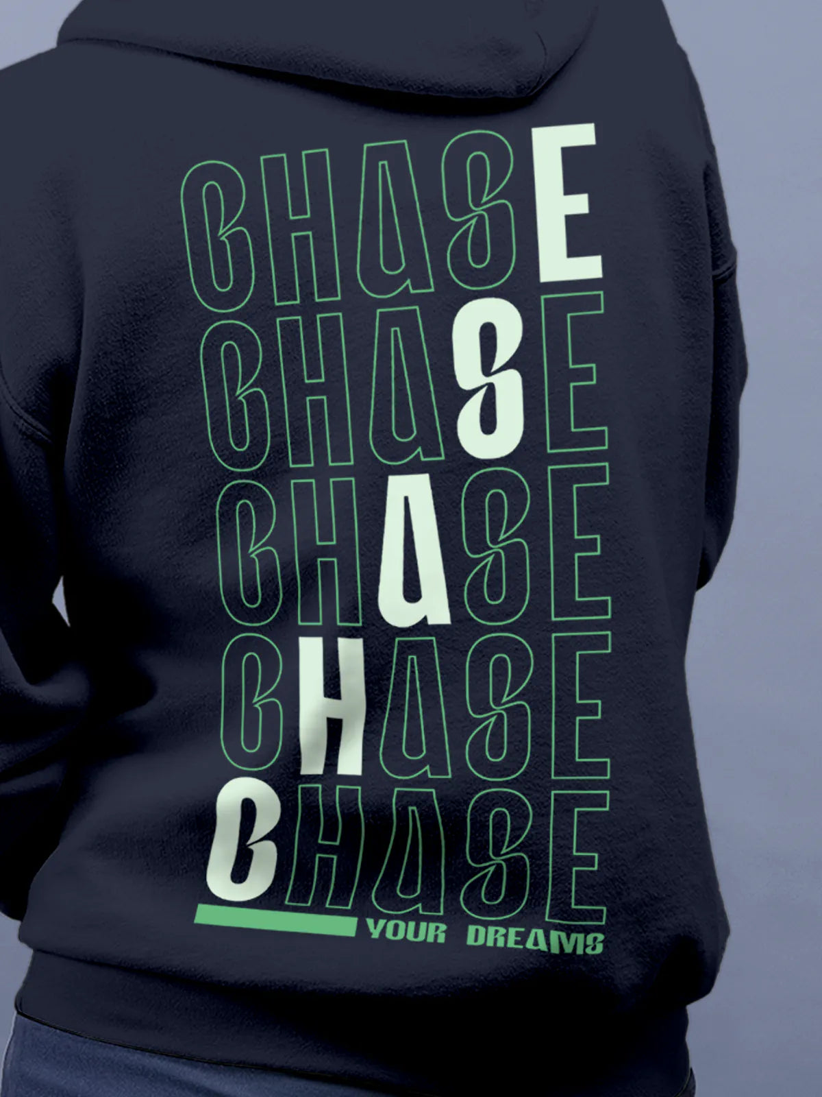 Close up of 'Chase Your Dreams' design on Women's Navy Blue Hoodie Sweatshirt, highlighting intricate details and vibrant print.
