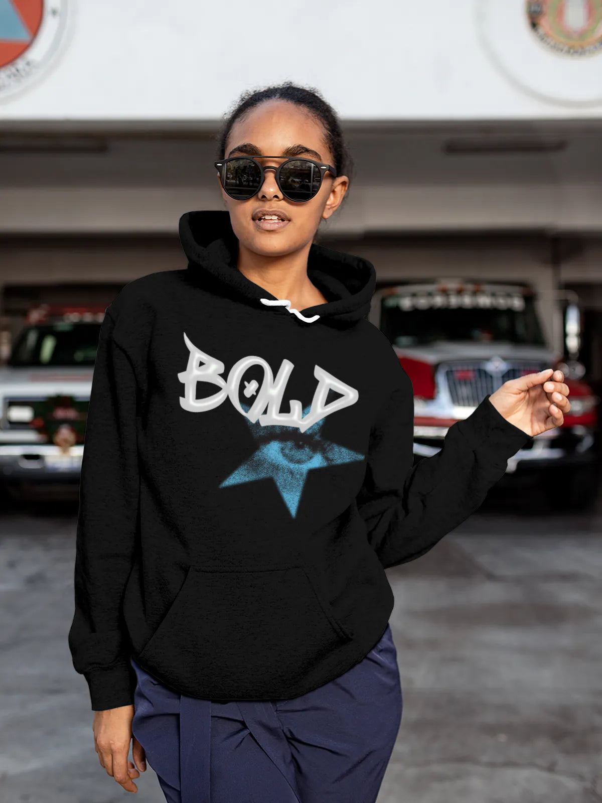 Model wearing Women's Black Hoodie Sweatshirt with 'Bold' design, offering effortless style and premium comfort