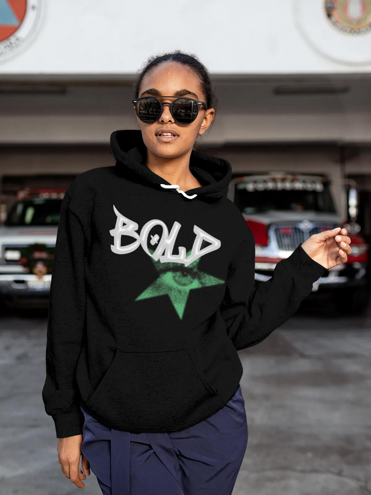 Model wearing Women's Black Hoodie Sweatshirt with 'Bold' design, offering effortless style and premium comfort