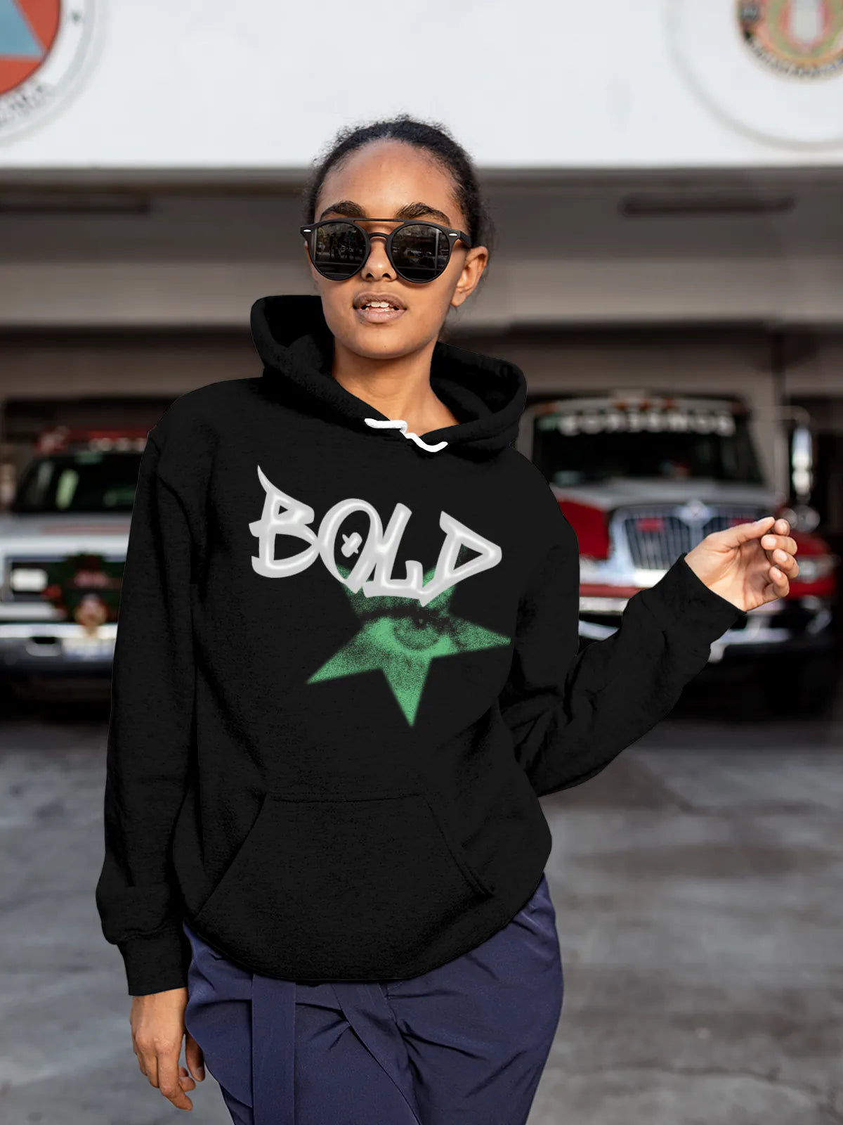 Model wearing Women's Black Hoodie Sweatshirt with 'Bold' design, offering effortless style and premium comfort