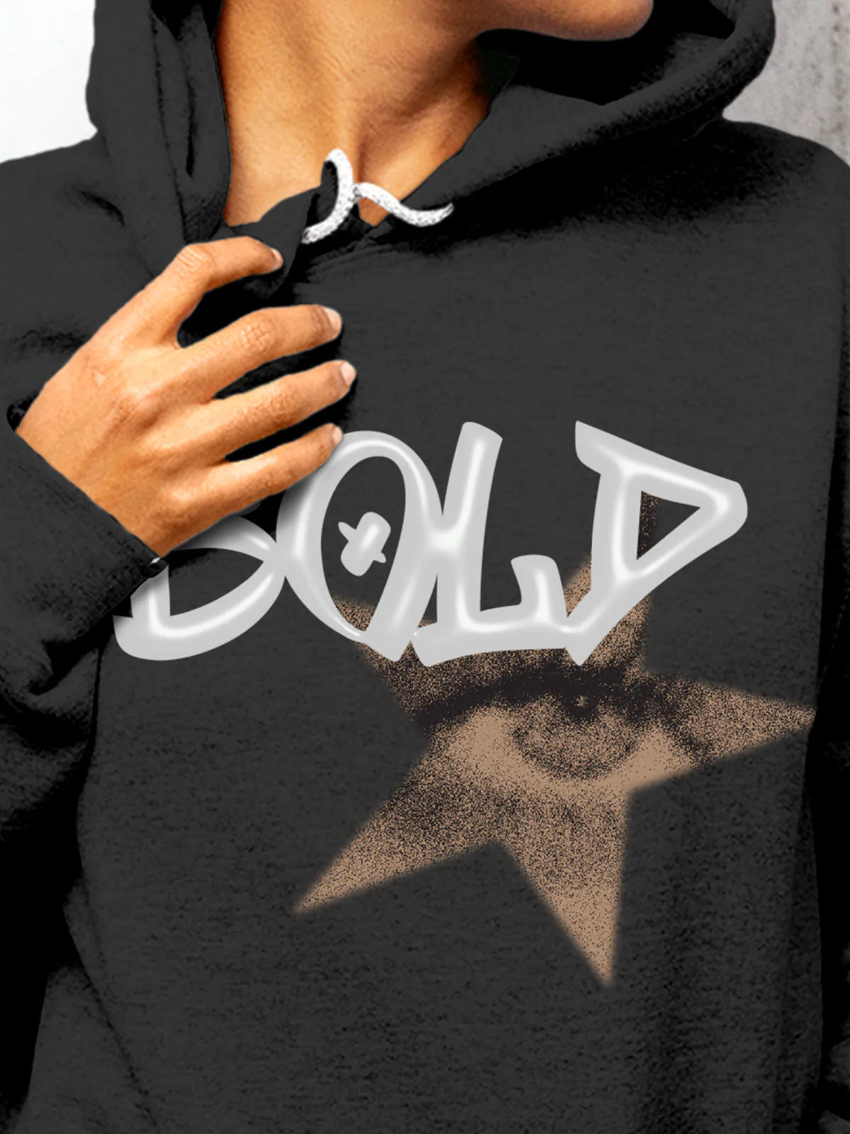 Close up of 'Bold' design on Women's Dark Grey Hoodie Sweatshirt, highlighting intricate details and vibrant print.
