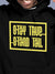 Close up of 'Stay True Stand Tall' design on Men's Black Hoodie Sweatshirt, highlighting intricate details and vibrant print.