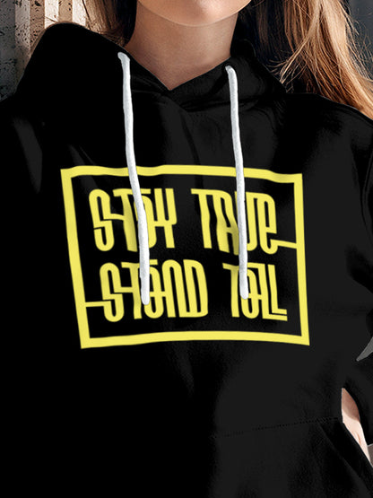 Close up of 'Stay True Stand Tall' design on Women's Black Hoodie Sweatshirt, highlighting intricate details and vibrant print.
