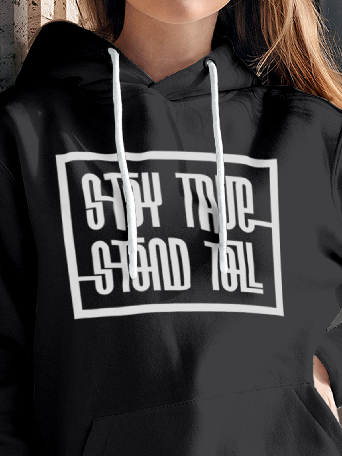 Close up of 'Stay True Stand Tall' design on Women's Dark Grey Hoodie Sweatshirt, highlighting intricate details and vibrant print.