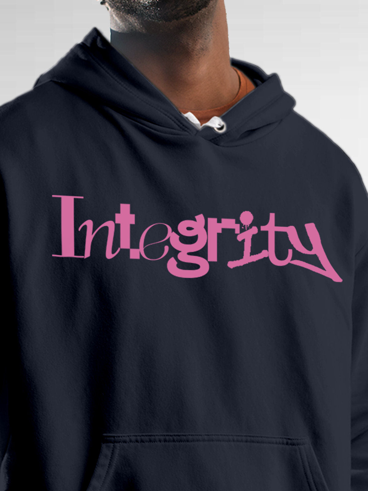 Close up of 'Integrity' design on Men's Navy Blue Hoodie Sweatshirt, highlighting intricate details and vibrant print.