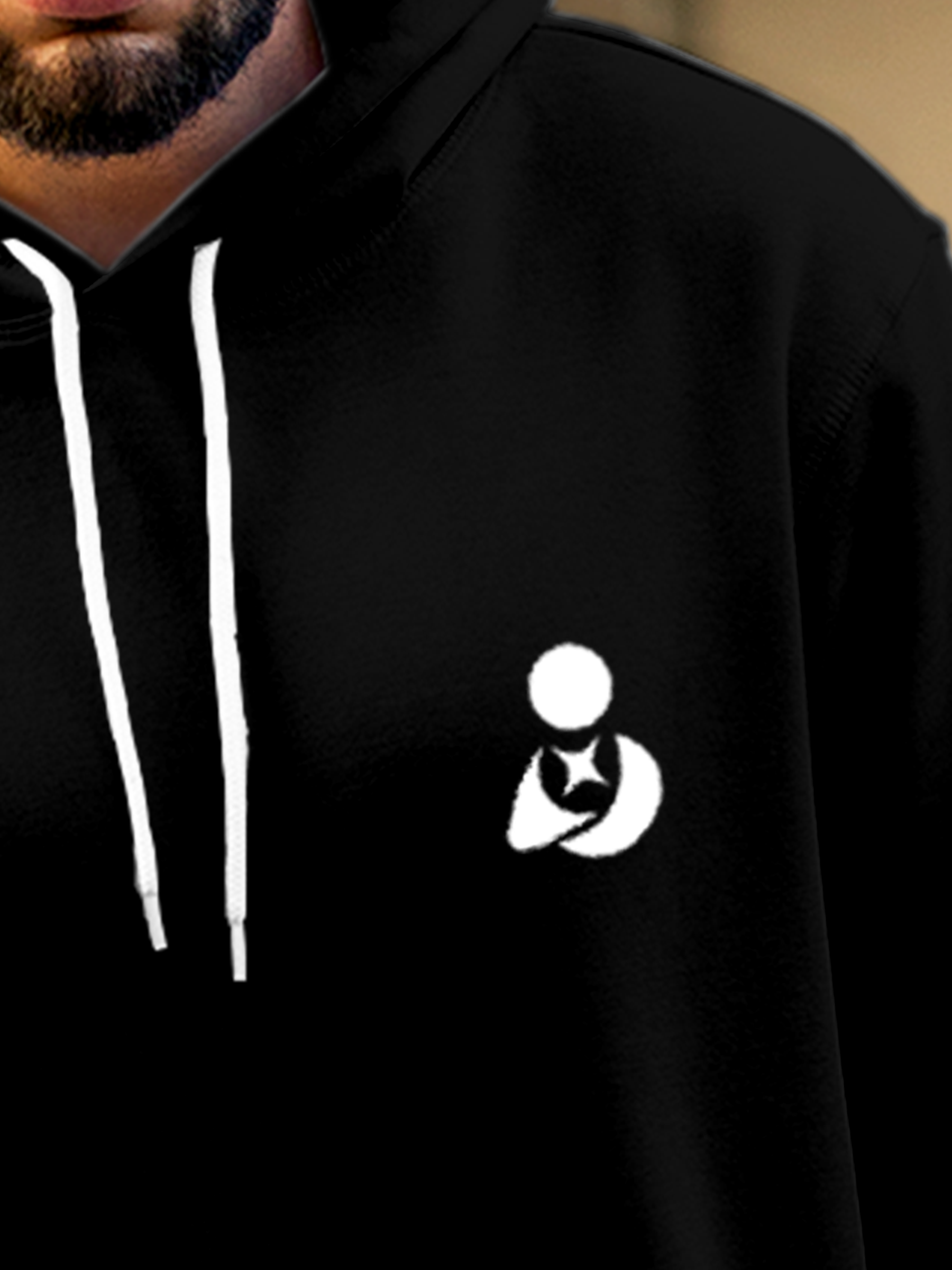 Close up of 'Fighterhero Logo' design on Men's Black Hoodie Sweatshirt, highlighting intricate details and vibrant print.