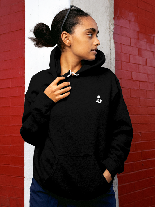 Model wearing Women's Solid Black Hoodie Sweatshirt with Fighterhero Logo, offering effortless style and premium comfort
