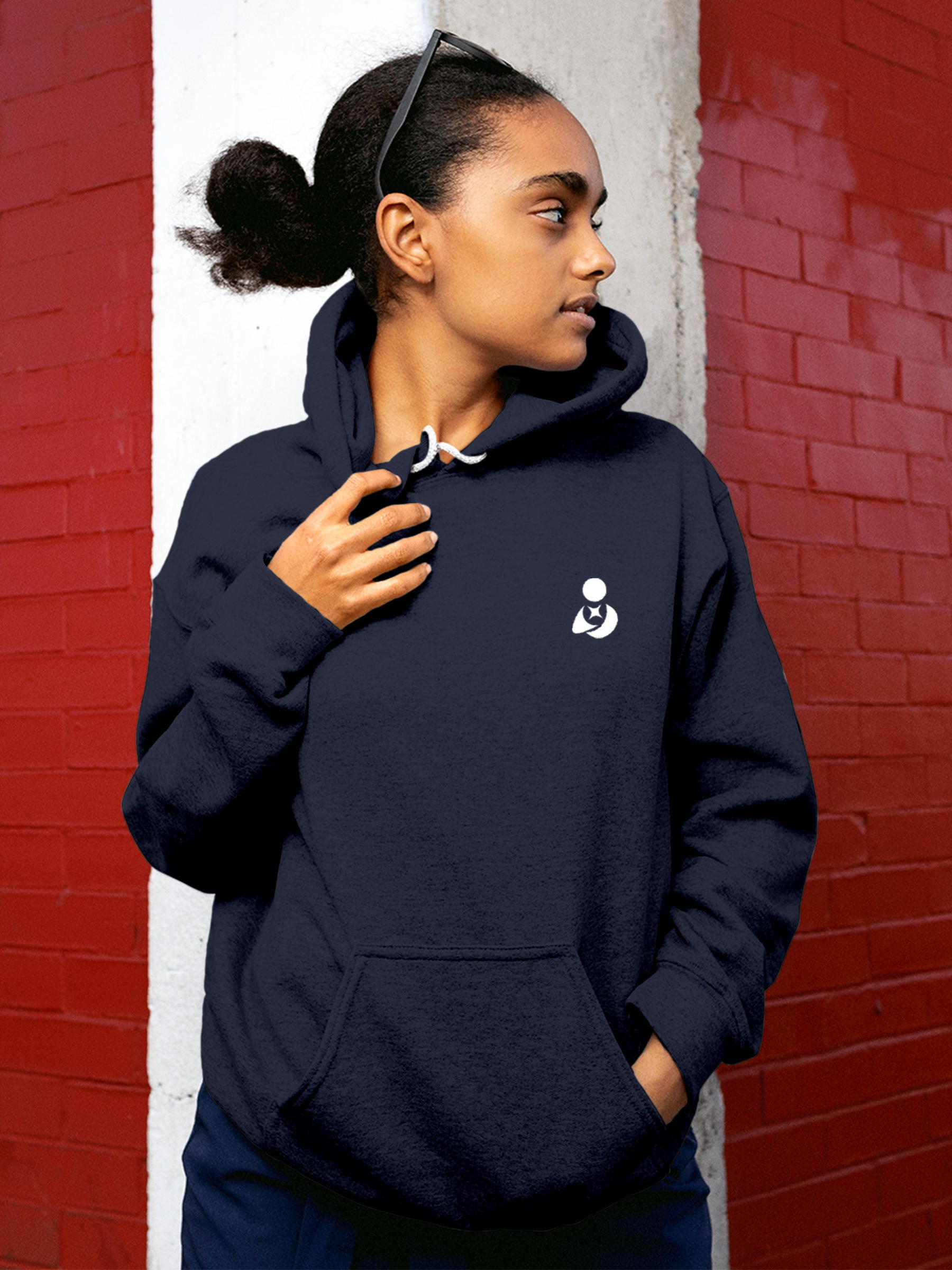 Model wearing Women's Solid Navy Blue Hoodie Sweatshirt with Fighterhero Logo, offering effortless style and premium comfort