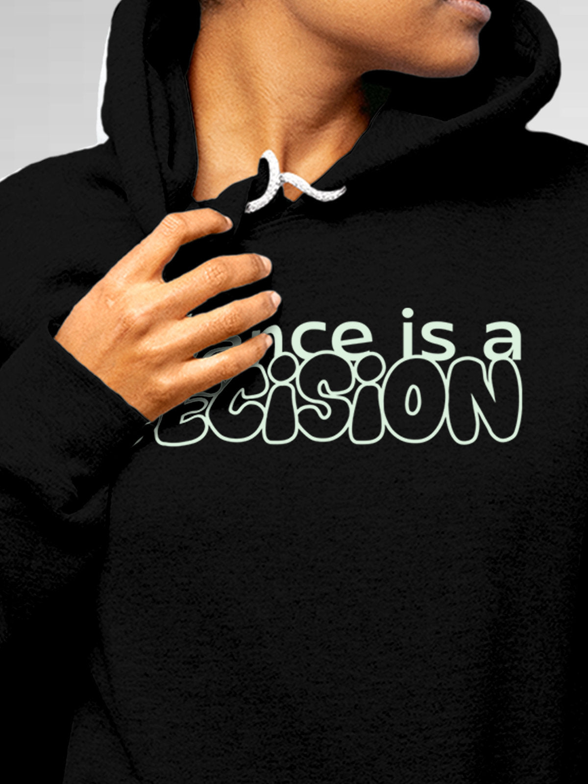 Close up of 'Balance Is A Decision' design on Women's Black Hoodie Sweatshirt, highlighting intricate details and vibrant print.