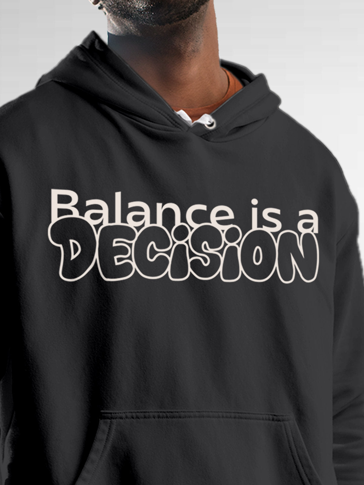 Close up of 'Balance Is A Decision' design on Men's Dark Grey Hoodie Sweatshirt, highlighting intricate details and vibrant print.