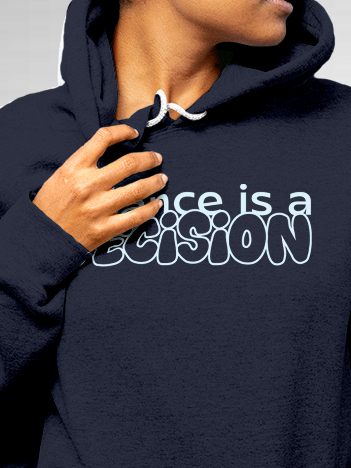 Close up of 'Balance Is A Decision' design on Women's Navy Blue Hoodie Sweatshirt, highlighting intricate details and vibrant print.