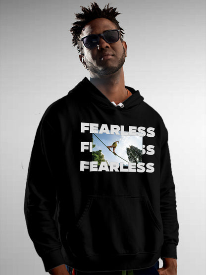 Model wearing Men's Black Hoodie Sweatshirt with 'Fearless' design, offering effortless style and premium comfort