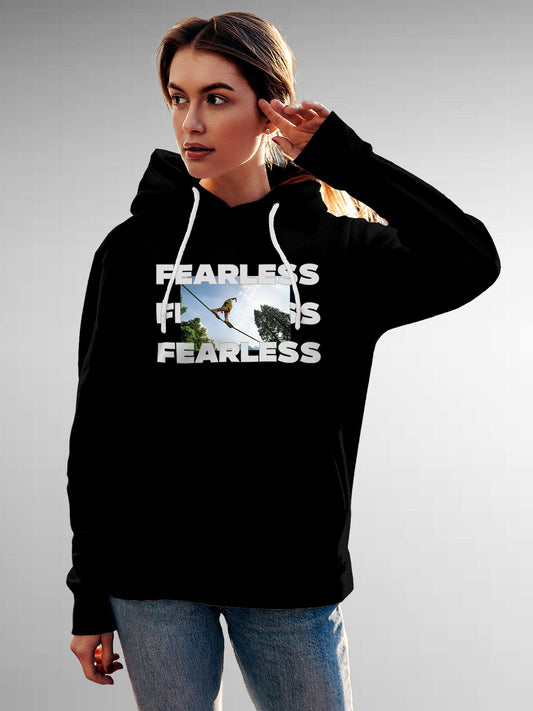 Model wearing Women's Black Hoodie Sweatshirt with 'Fearless' design, offering effortless style and premium comfort