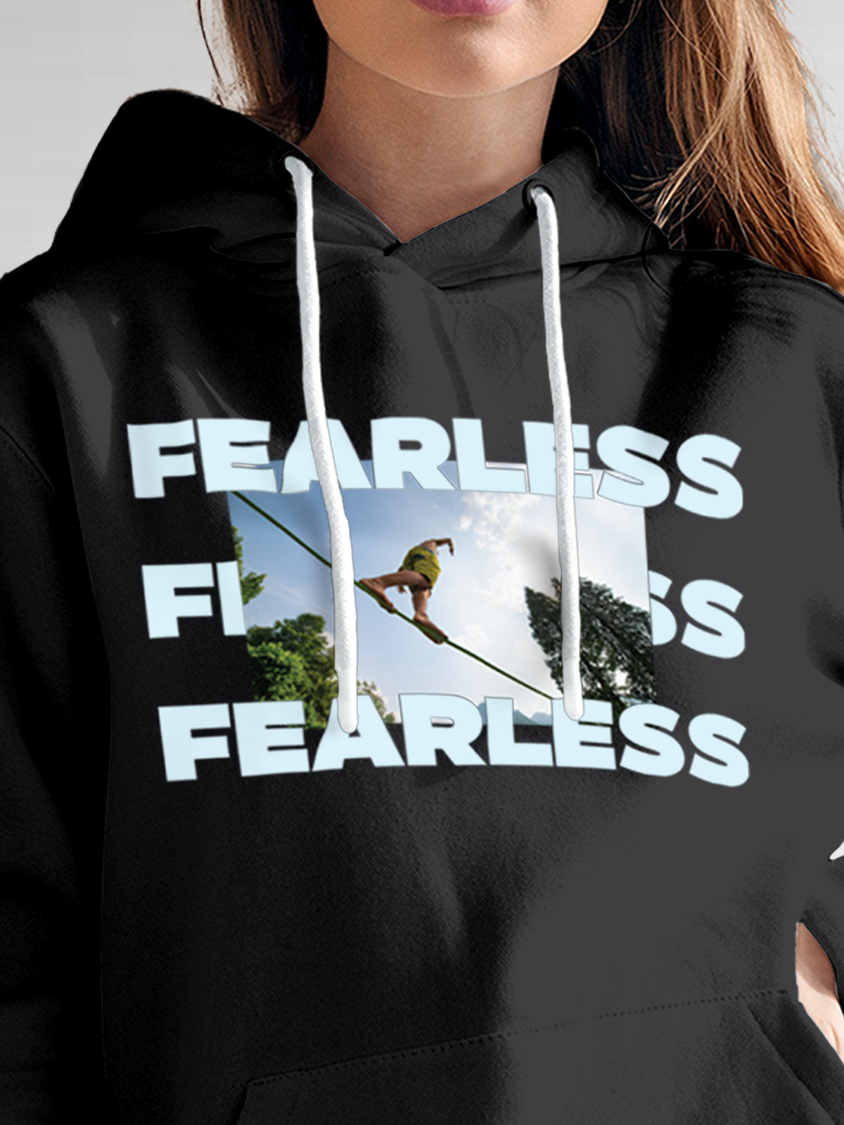 Close up of 'Fearless' design on Women's Dark Grey Hoodie Sweatshirt, highlighting intricate details and vibrant print.