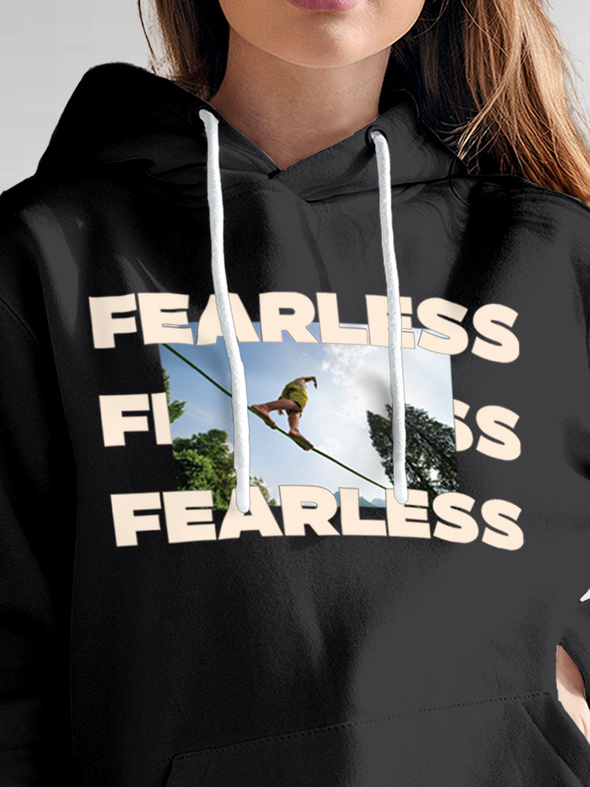 Close up of 'Fearless' design on Women's Dark Grey Hoodie Sweatshirt, highlighting intricate details and vibrant print.