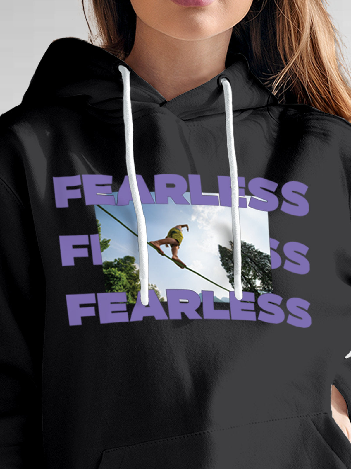 Close up of 'Fearless' design on Women's Dark Grey Hoodie Sweatshirt, highlighting intricate details and vibrant print.