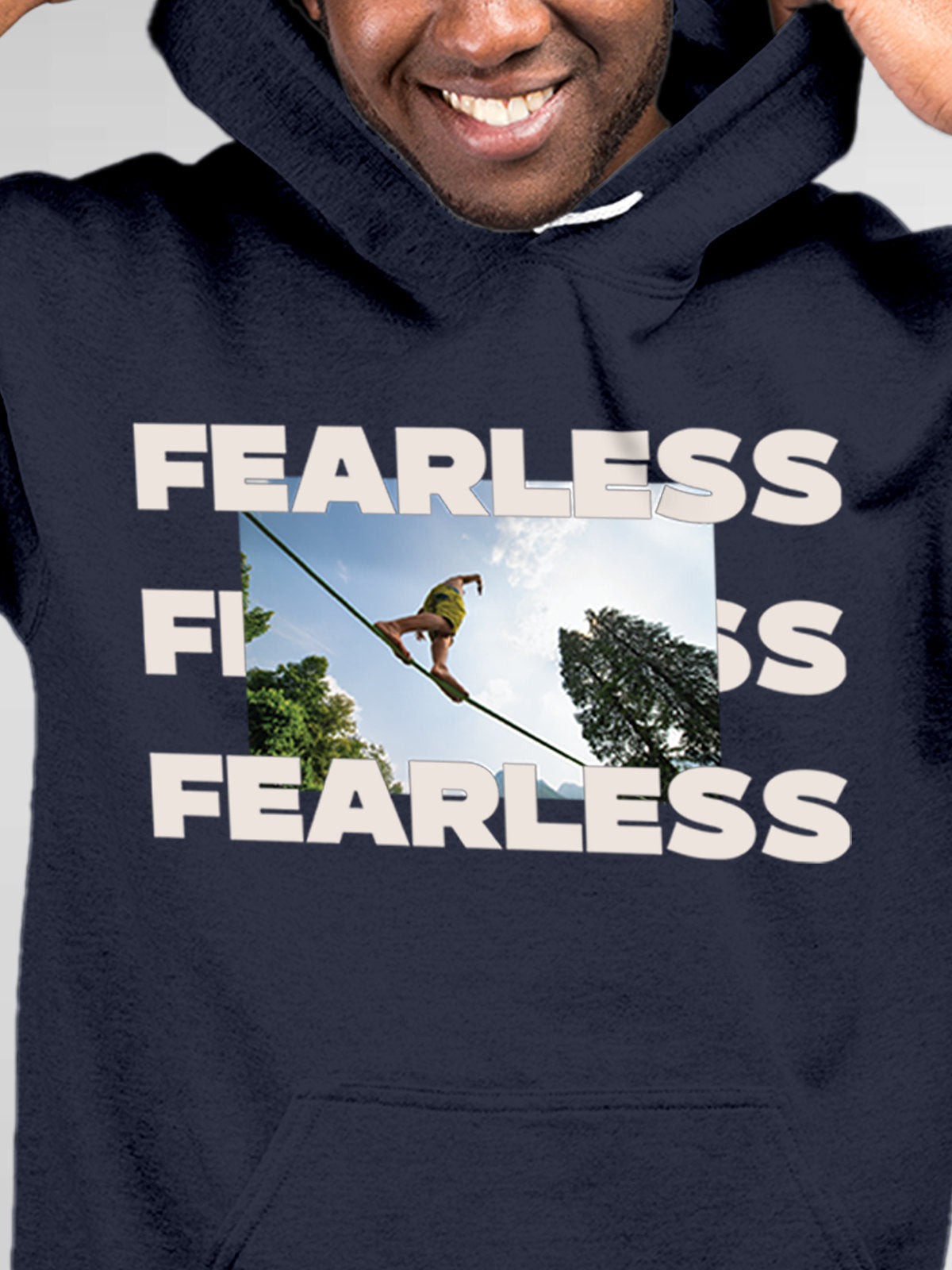 Close up of 'Fearless' design on Men's Navy Blue Hoodie Sweatshirt, highlighting intricate details and vibrant print.