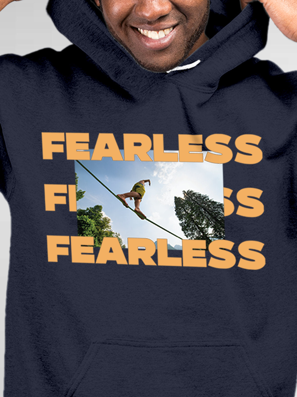 Close up of 'Fearless' design on Men's Navy Blue Hoodie Sweatshirt, highlighting intricate details and vibrant print.