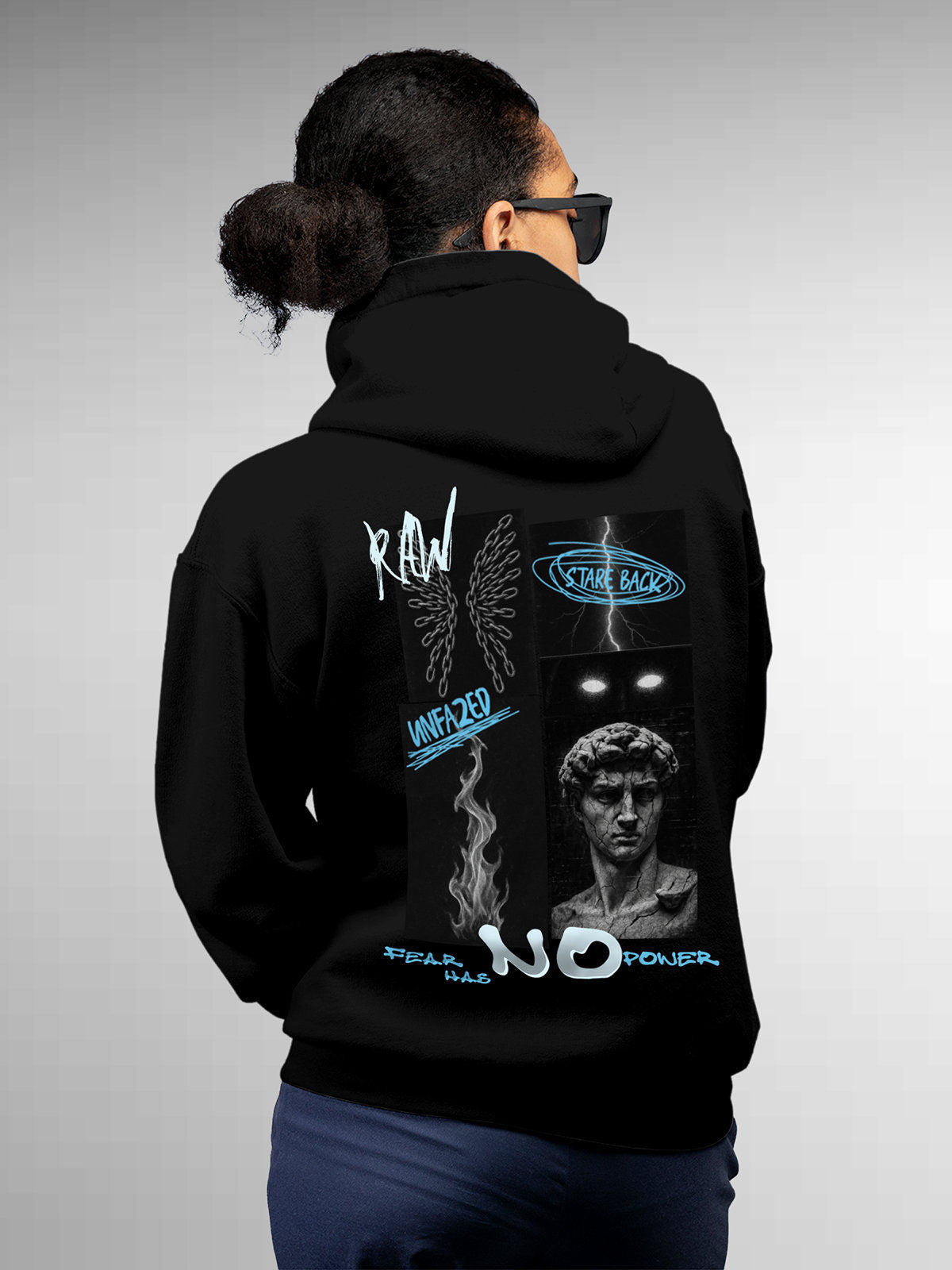 Model wearing Women's Black Hoodie Sweatshirt with 'Face The Fear' design, offering effortless style and premium comfort