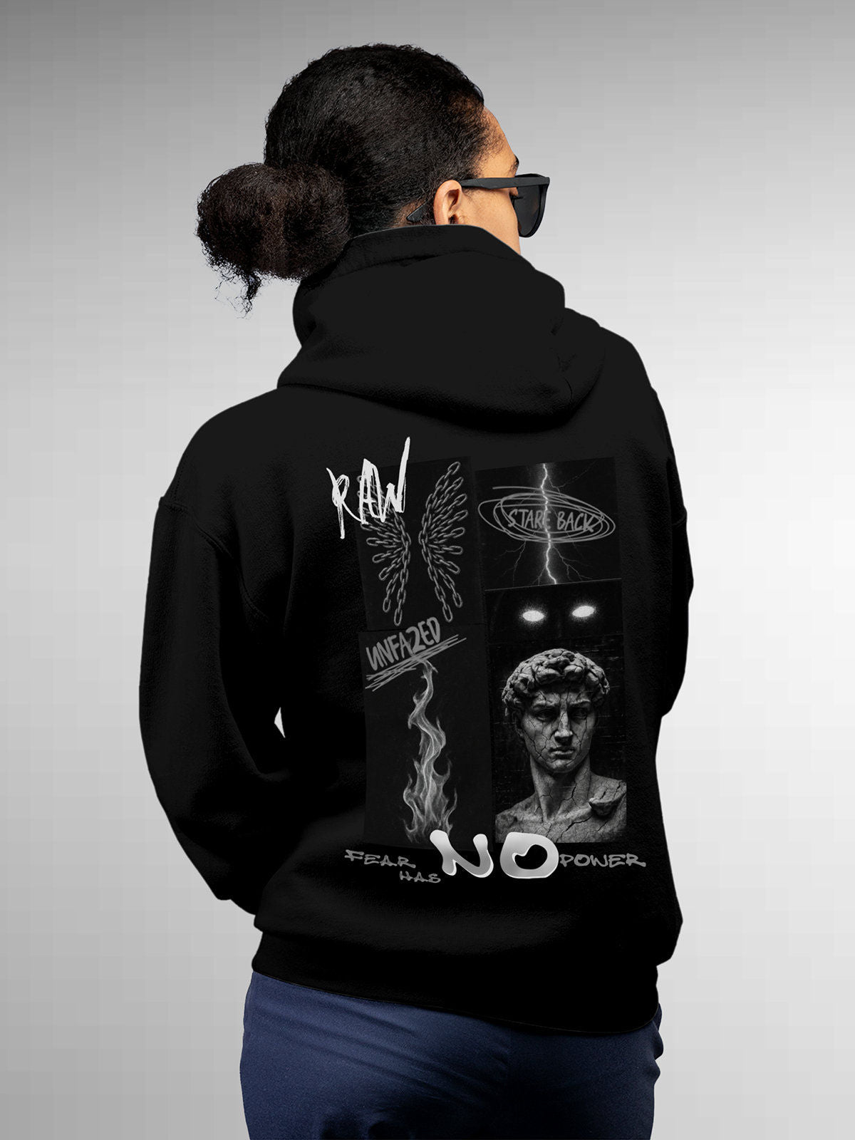 Model wearing Women's Black Hoodie Sweatshirt with 'Face The Fear' design, offering effortless style and premium comfort