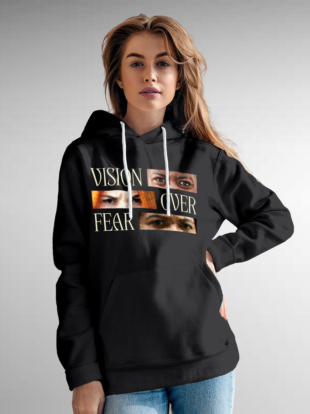 Model wearing Women's Dark Grey Hoodie Sweatshirt with 'Vision Over Fear' design, offering effortless style and premium comfort