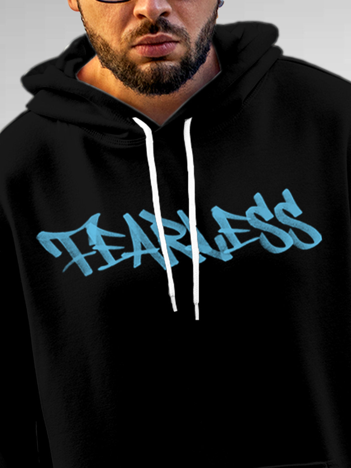Close up of 'Fearless' design on Men's Black Hoodie Sweatshirt, highlighting intricate details and vibrant print.