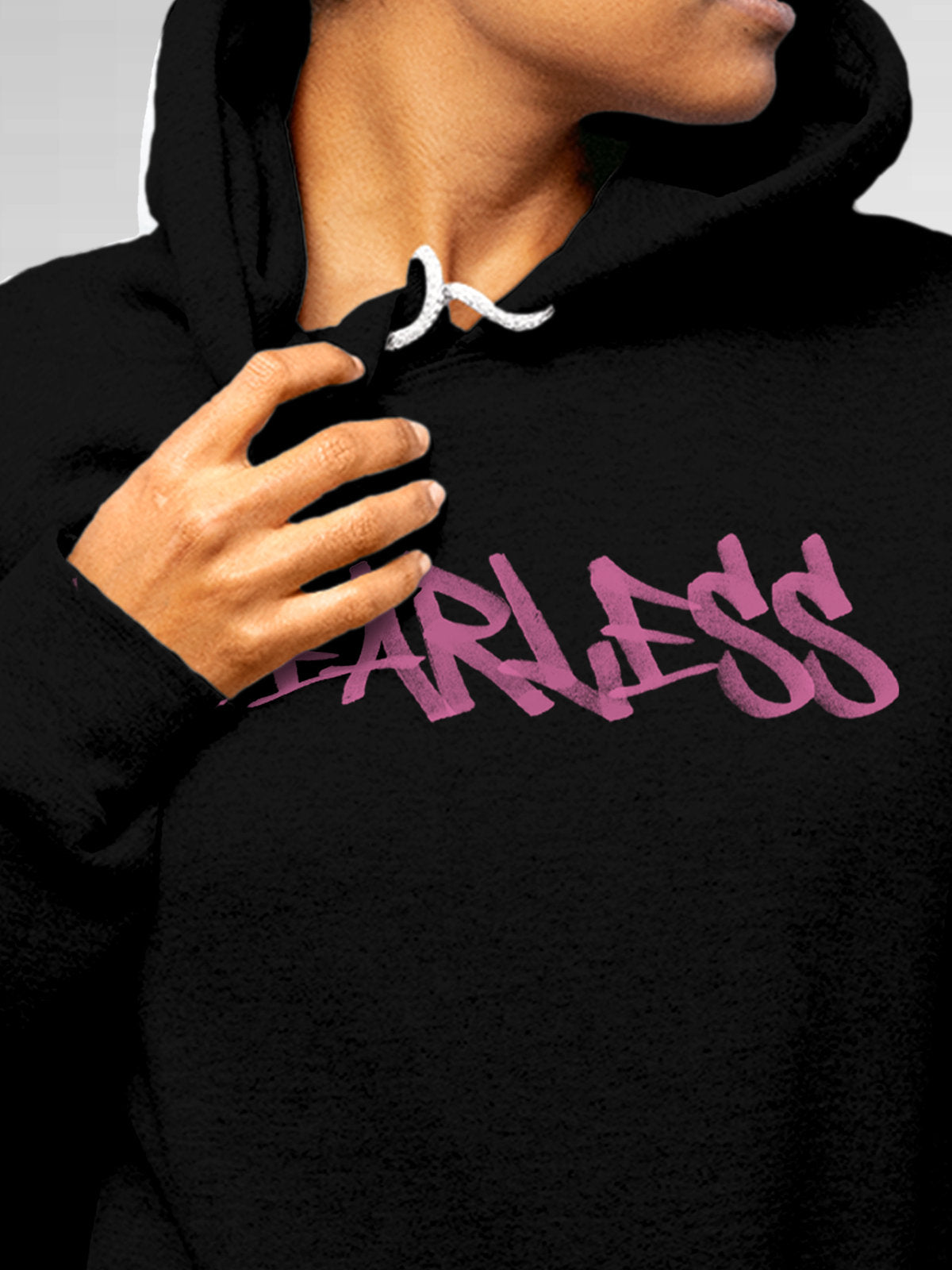 Close up of 'Fearless' design on Women's Black Hoodie Sweatshirt, highlighting intricate details and vibrant print.