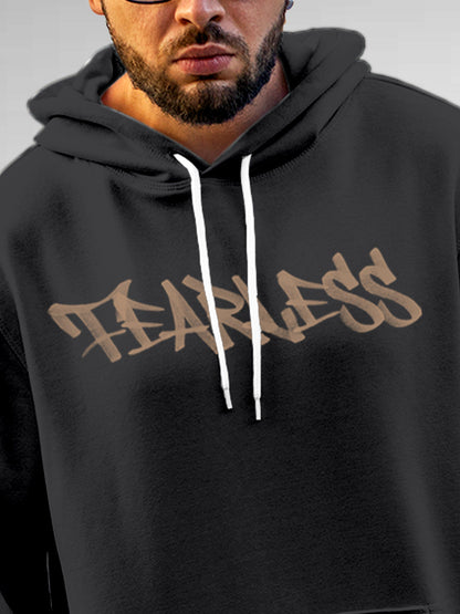 Close up of 'Fearless' design on Men's Dark Grey Hoodie Sweatshirt, highlighting intricate details and vibrant print.