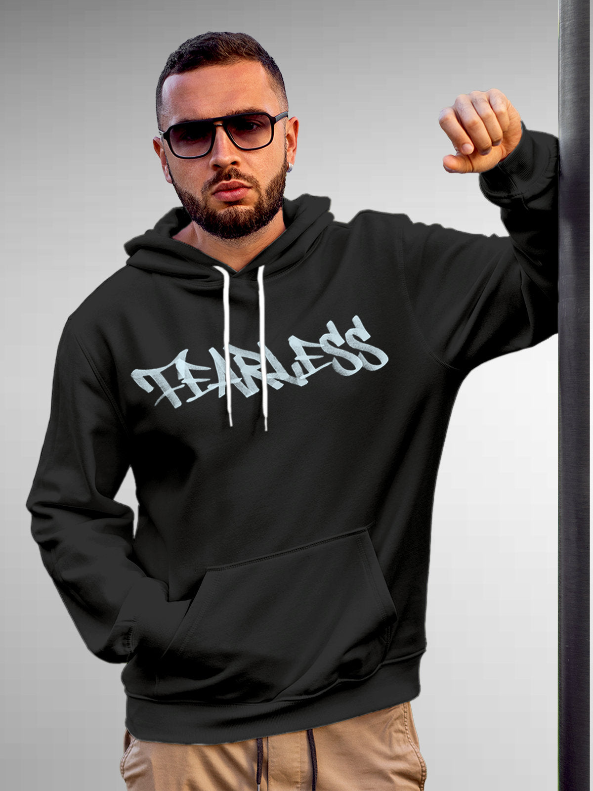 Model wearing Men's Dark Grey Hoodie Sweatshirt with 'Fearless' design, offering effortless style and premium comfort