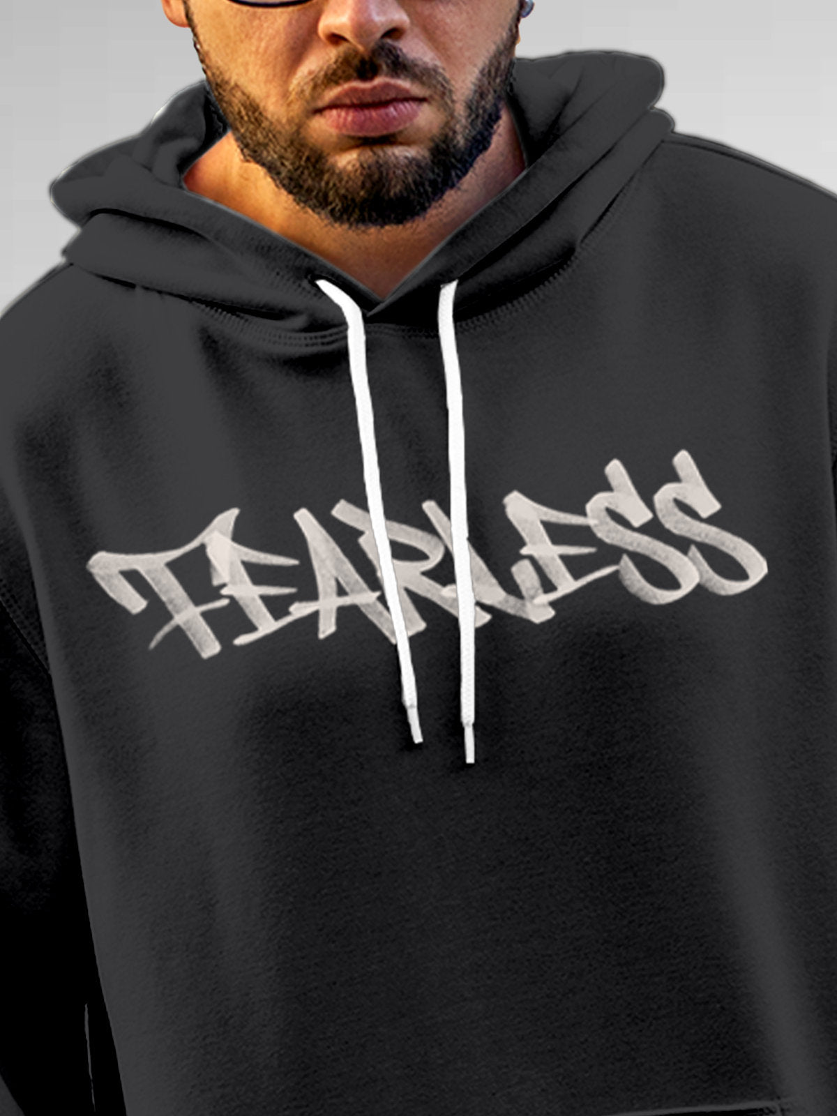 Close up of 'Fearless' design on Men's Dark Grey Hoodie Sweatshirt, highlighting intricate details and vibrant print.