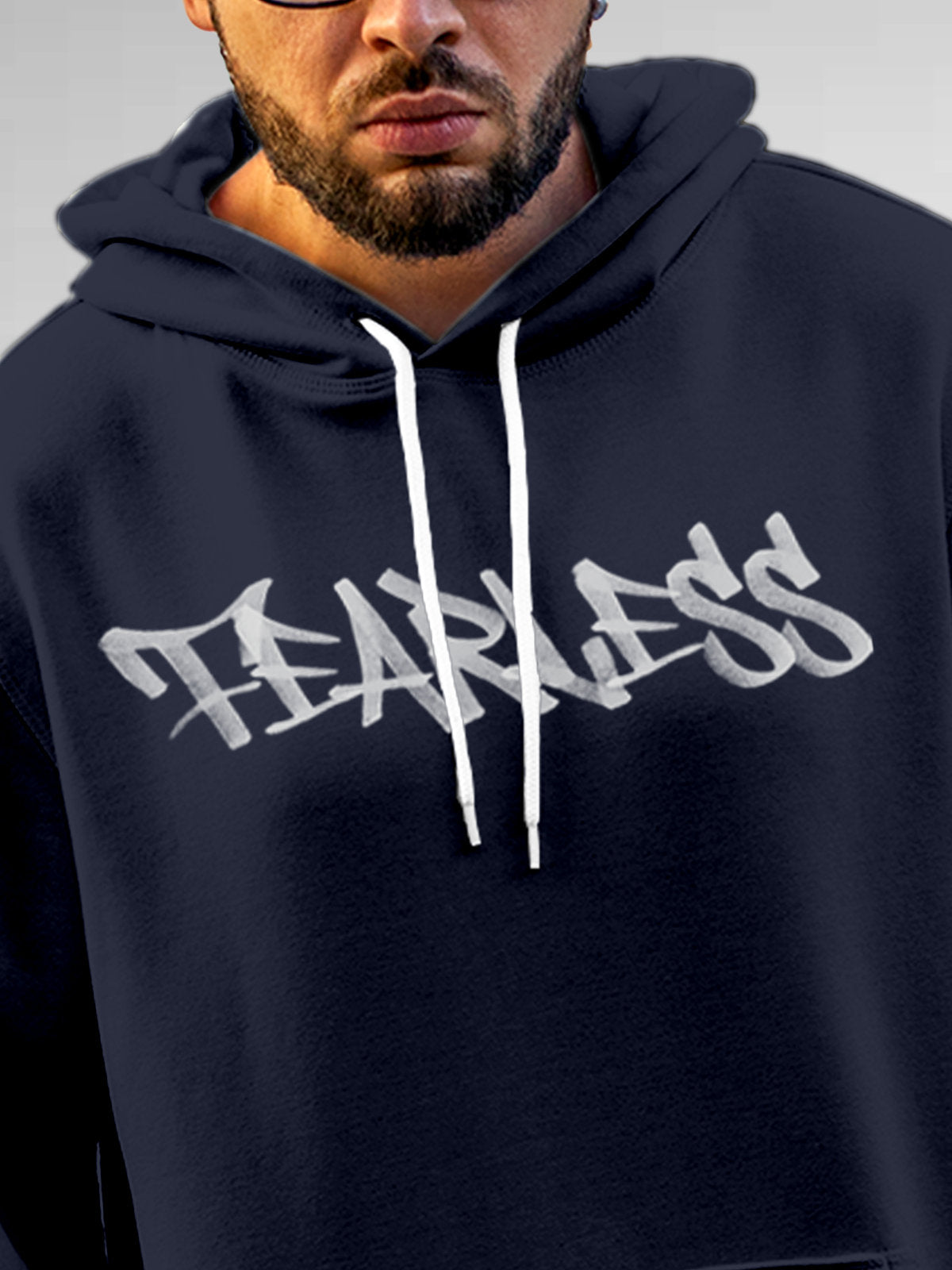 Close up of 'Fearless' design on Men's Navy Blue Hoodie Sweatshirt, highlighting intricate details and vibrant print.
