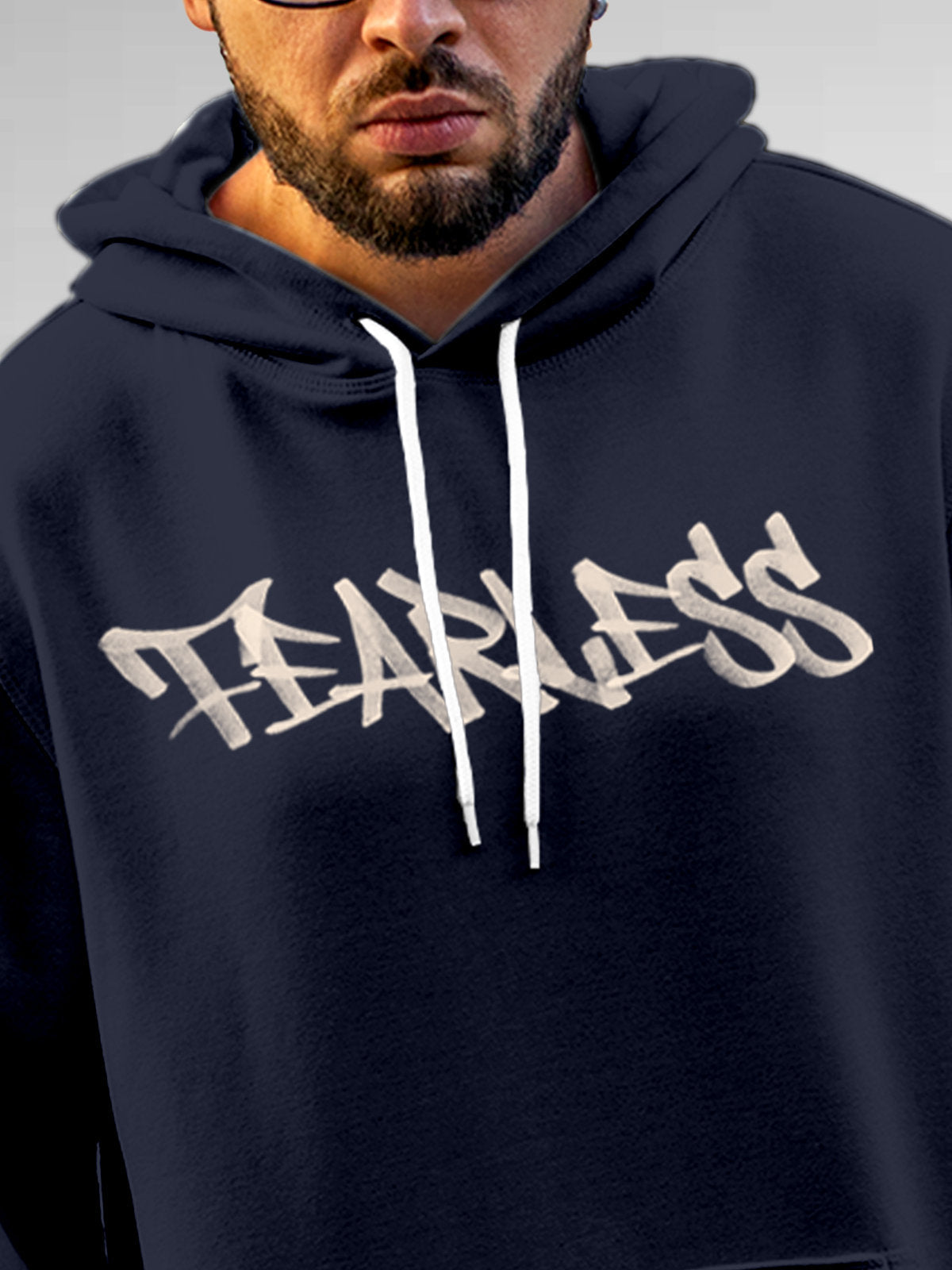 Close up of 'Fearless' design on Men's Navy Blue Hoodie Sweatshirt, highlighting intricate details and vibrant print.